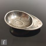 A George III silver jockey cap caddy spoon, engraved with linear designs to the interior, stamped