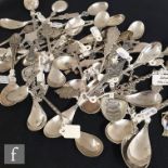 A collection of various early to mid 20th Century Dutch silver spoons, mostly souvenir spoons with