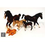 A Beswick Cantering Shire horse, model 975, together with two foals, model 1816 and model 915, a