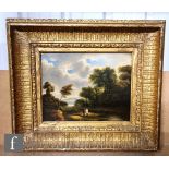 ENGLISH SCHOOL (EARLY 19TH CENTURY) - Figures in a wooded river landscape, oil on panel, framed 19cm