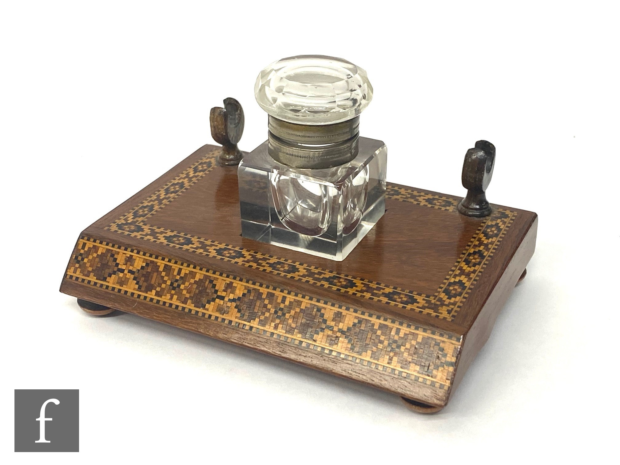A 19th century Tunbridgeware inkstand with single square cut inkwell and pen holder, on bun feet,
