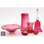 A collection of assorted Victorian ruby glass, comprising a bowl of circular section with wave rim