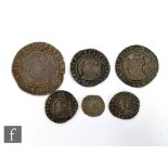 An Elizabeth I (1558-1603) shilling, groat, half groat, sixpence, threepence and a hammered