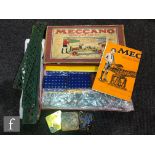 A box for Meccano Accessory Outfit Da, with picture label and instructions dated 1934, containing