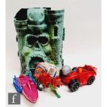 A collection of Mattel Masters of the Universe items, to include Castle Grayskull, Battlecat,