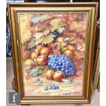 ERNEST PHILLIPS (EARLY 20TH CENTURY) - A still life of grapes and apples, watercolour, signed,