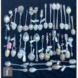 A parcel lot of assorted silver and white metal teaspoons to include South Korean, Indian and