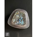 A Danish silver brooch of cushioned trapezoid form detailed with raised central abalone shell