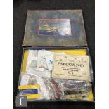 A Meccano Aeroplane Constructor No. 2 Outfit, in red and cream, with small parts tins and