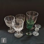 A small group of 19th Century drinking glasses to include slice cut, engraved and plain examples. (