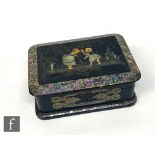 A 19th century papier-mâché and mother of pearl inlaid jewellery casket, the cover painted and