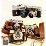 A collection of vintage 35mm rangefinder cameras, to include a Zenite- E, serial number 67025946,