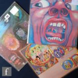 A group of three King Crimson LPs, 'In The Wake Of Poseidon', ILPS-9127, 1st pressing, pink label