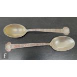A pair of early 20th Century American Sterling silver teaspoons in the aesthetic taste with part