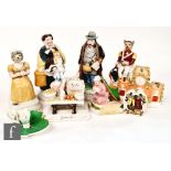 A collection of assorted Victorian novelty figures to include a Fairing entitled 'Oysters Sir', a