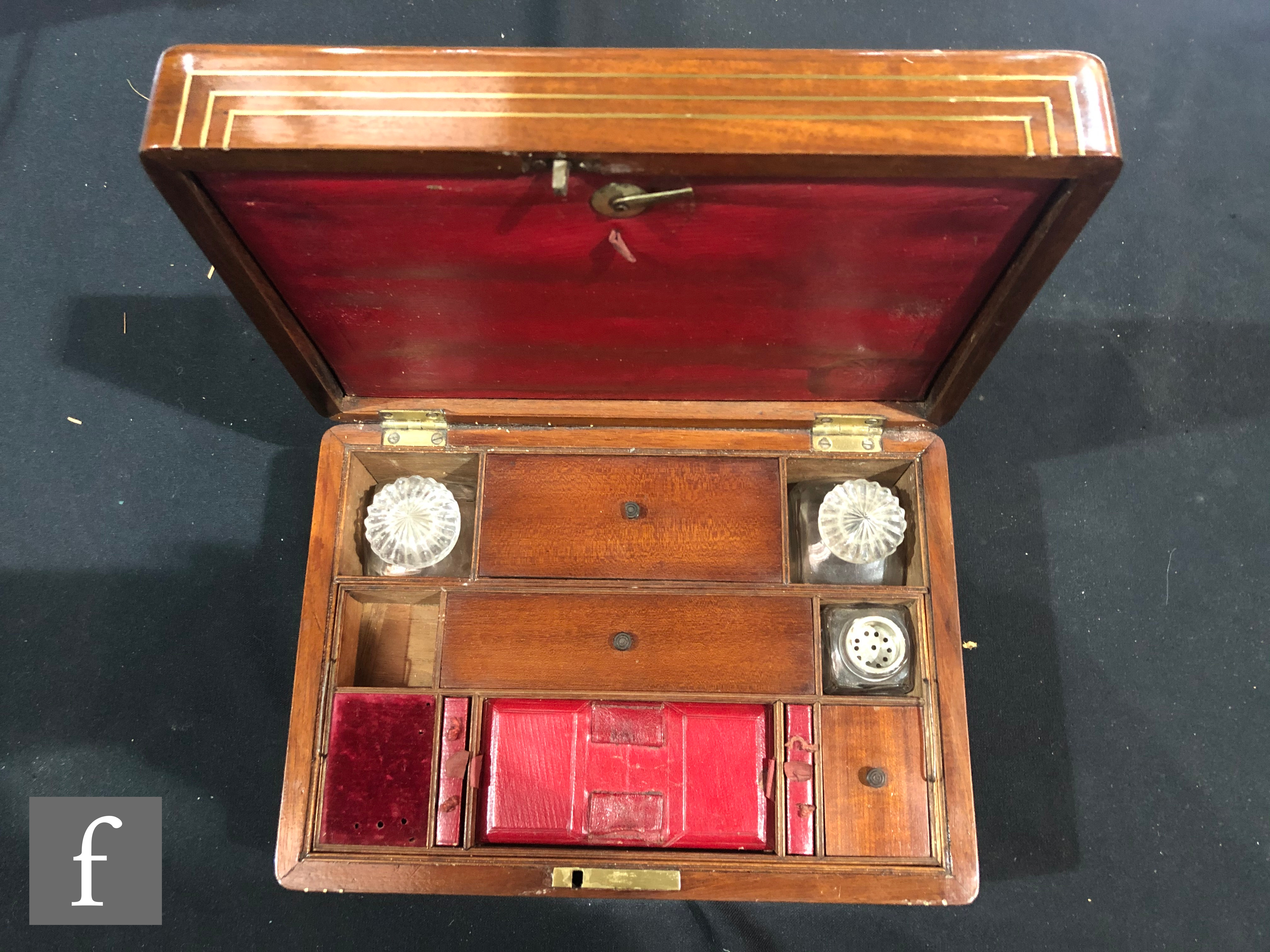 A Regency rosewood gentleman?s dressing case, the triple strung brass lid opening to reveal a red - Image 2 of 4