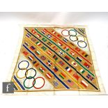 A 1936 Olympic Games commemorative silk head scarf, decorated with the flags of the competing