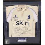 A Warwickshire county cricket club signed shirt for the 2012 winners, framed 88cm x 75cm.
