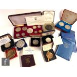 An Elizabeth II Britannia silver Selby Abbey medal, two Churchill medallions, two 1964 Bermuda