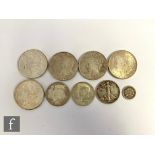 Five American Morgan dollars 1880, 1883, 1887 and 1921, a Liberty dollar 1924 and two half dollars