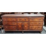 A George III and later mahogany crossbanded oak dresser, central drawer and cupboard flanked by faux