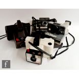 A collection of Polaroid cameras, to include an Automatic 340 land camera, with original case, a