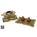 A Victorian oyster shell sweet meat dish on plated stand and a brass ink stand fitted with two