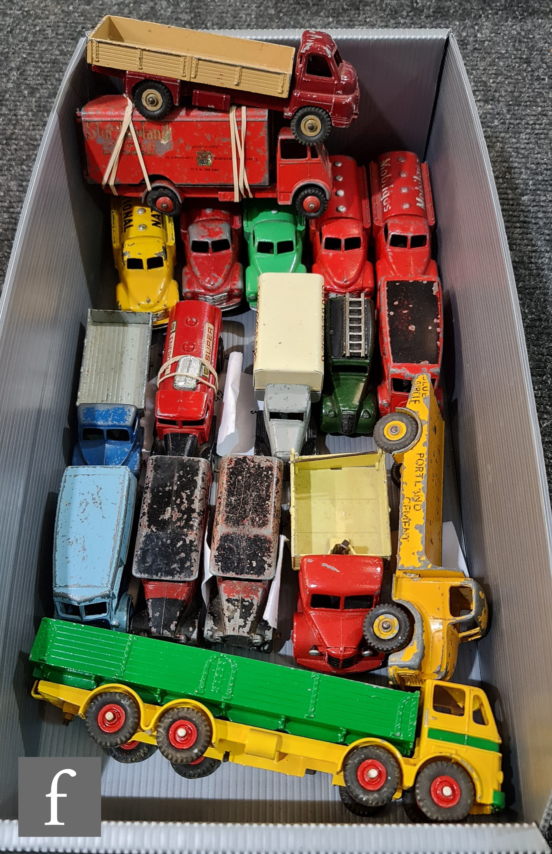A collection of assorted unboxed and playworn Dinky diecast models, all commercial vehicles, to