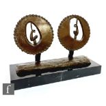 A 20th Century bronze and resin marble sculpture mounted in the form of two spheres each depicting