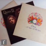 A Queen 'A Night At The Opera' LP, EMTC 103, 1st pressing x 2, and 'Queen II', EMA 767. (3)