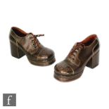 A pair of 1970s Anthony F Richardson men's platform stacked heel shoes in brown leather with pierced