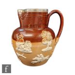 A late 19th Century Doulton Lambeth salt glazed jug decorated with tavern and hunting scenes, the
