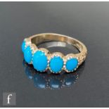 A 9ct hallmarked Victorian style graduated five stone turquoise ring, oval claw set stones to