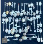 A parcel lot of Asian silver and white metal teaspoons to include Chinese and Hong Kong examples,