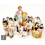 A collection of assorted 19th Century Staffordshire figures and flatbacks to include a Scottish