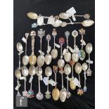 A parcel lot of hallmarked silver souvenir teaspoons relating to Wales, to include Cardiff,