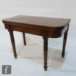 A George IV mahogany tea table, the reeded D shaped top over a plain frieze, on ring turned legs,