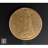 A Victorian jubilee head five pound piece dated 1887, A/F.