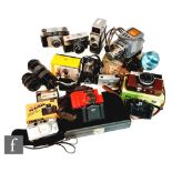 A collection of cameras and related lenses and equipment to include a Tamron zoom macro BBar Mult C.