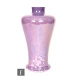 Ruskin Pottery - A vase of high shouldered tapering form decorated in an all over lavender lustre,