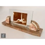Unknown - A 1930s Art Deco photograph frame, the arched variegated marble base with triple