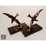 Unknown - A pair of 1930s patinated spelter figures of seagulls in flight, above crashing waves,