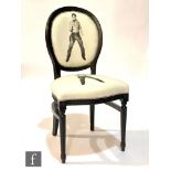 Unknown - Andrew Martin - A contemporary side chair with oval back and tapered leg, finished in