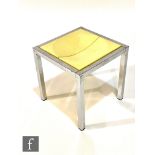 Frank Wardle - Vono - A cream coloured moulded plastic stool with a dished seat over a chromium