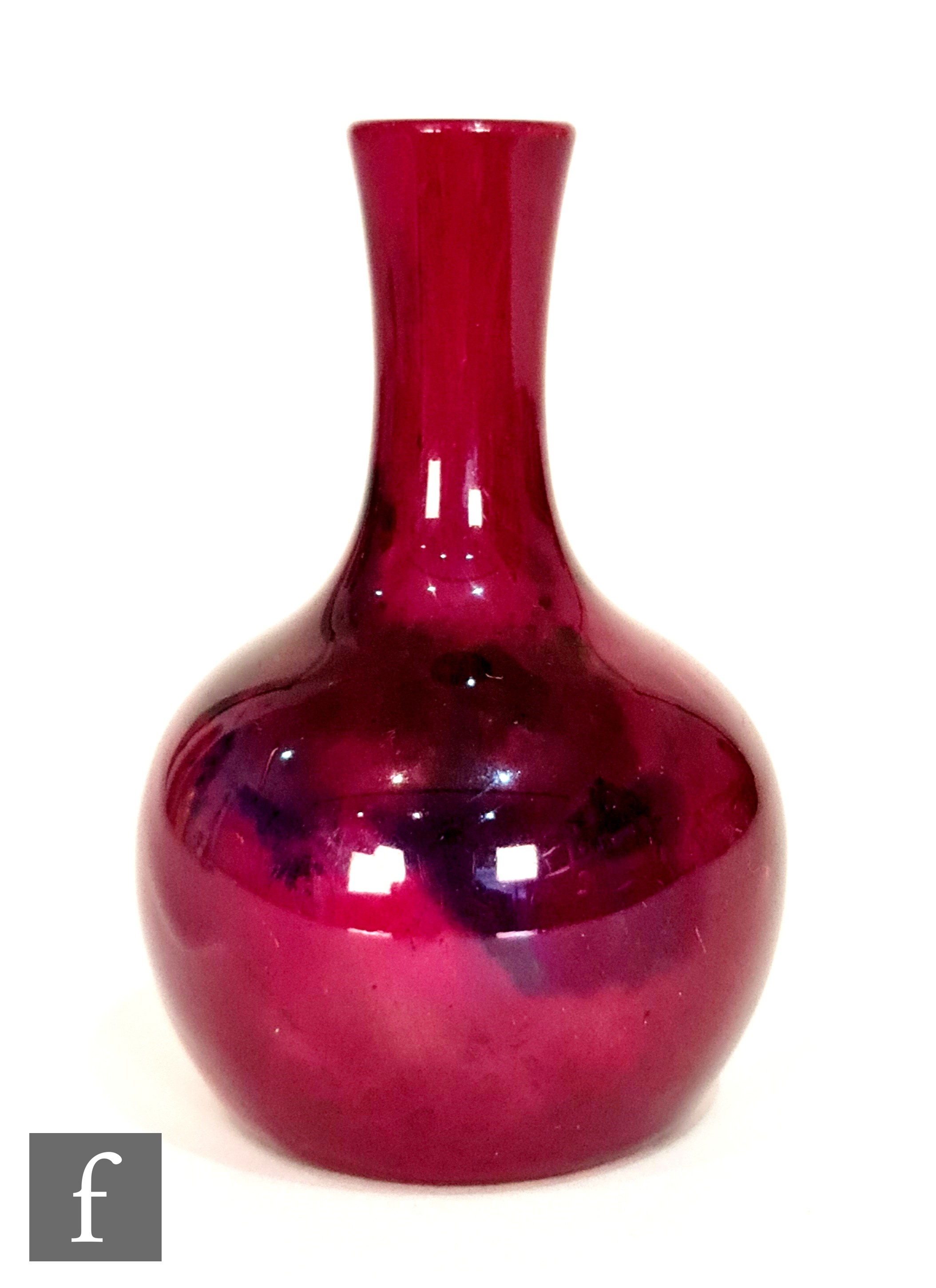 Bernard Moore - A small early 20th Century flambe glaze vase of globe and shaft form decorated in an