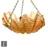 Unknown - A 1930s Art Deco ceiling light fitting, the pink relief moulded glass shade formed from