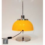 Harvey Guzzini - A yellow 'Mushroom' lamp, the chrome circular base with slender stem rising to a