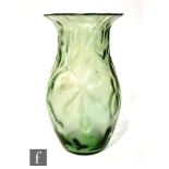 John Walsh Walsh - An early 20th Century Art Nouveau glass vase of ovoid form with everted rim,