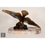 Unknown - A 1930s Art Deco patinated spelter figure of a swooping seagull above rolling waves,