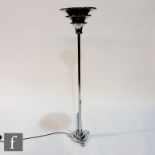Unknown - A 1930s chrome standard lamp, triform stepped base rising to slender column and stepped